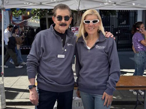 Dr. Christo Zouves and Dr. Kay Waud attend the Castro Street Fair.